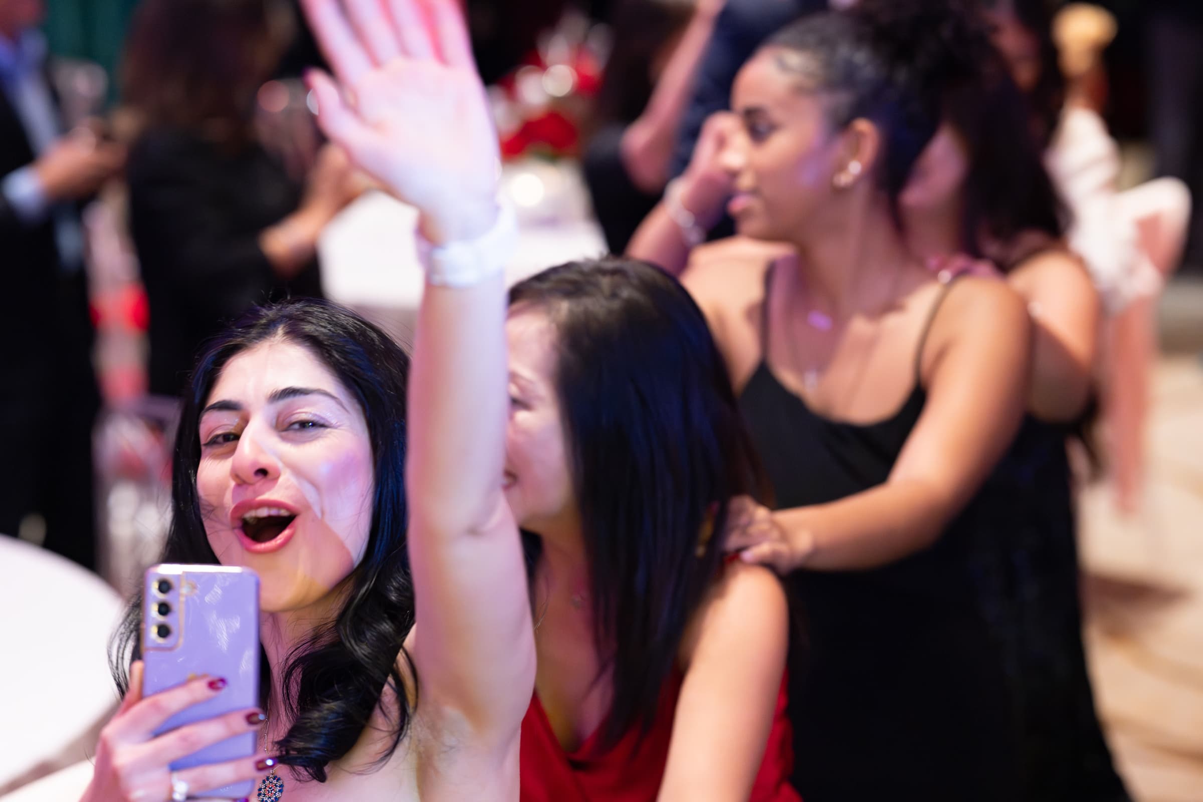 Guests dancing together on a crowded dance floor