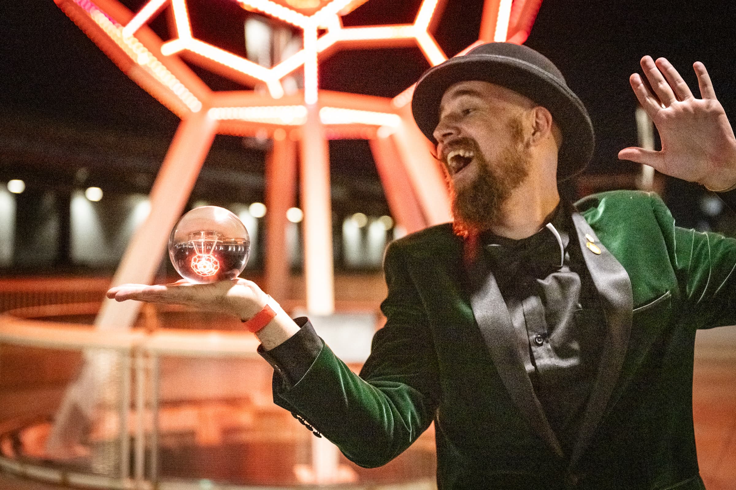 Performer mid-act during an evening event