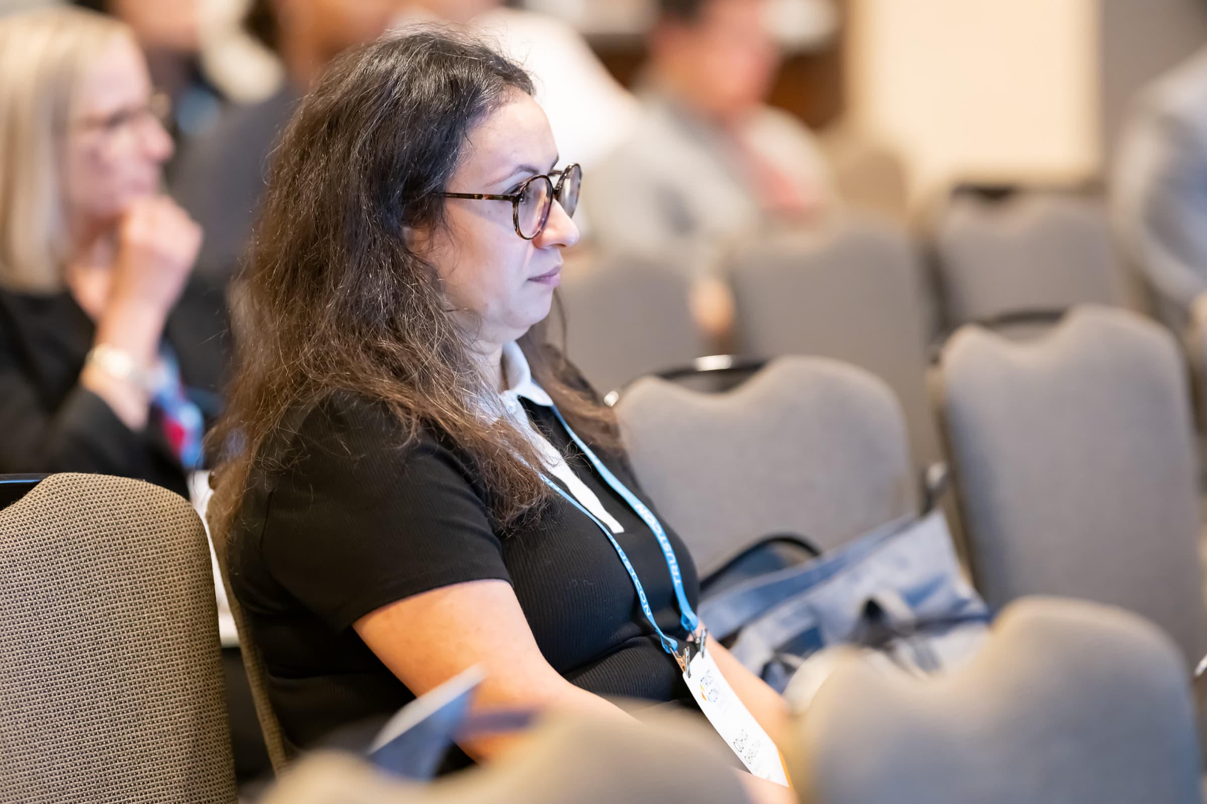 Attendee listening in profile during a breakout session