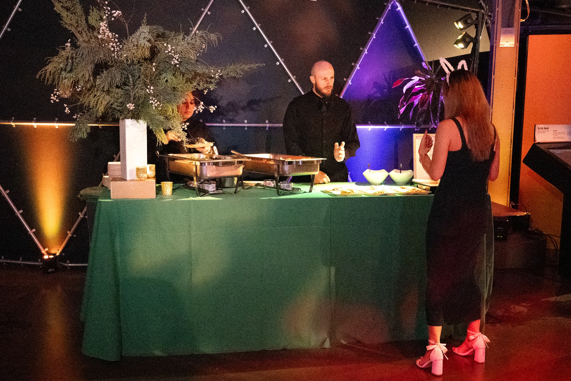 Catering station photographed during service at an evening event