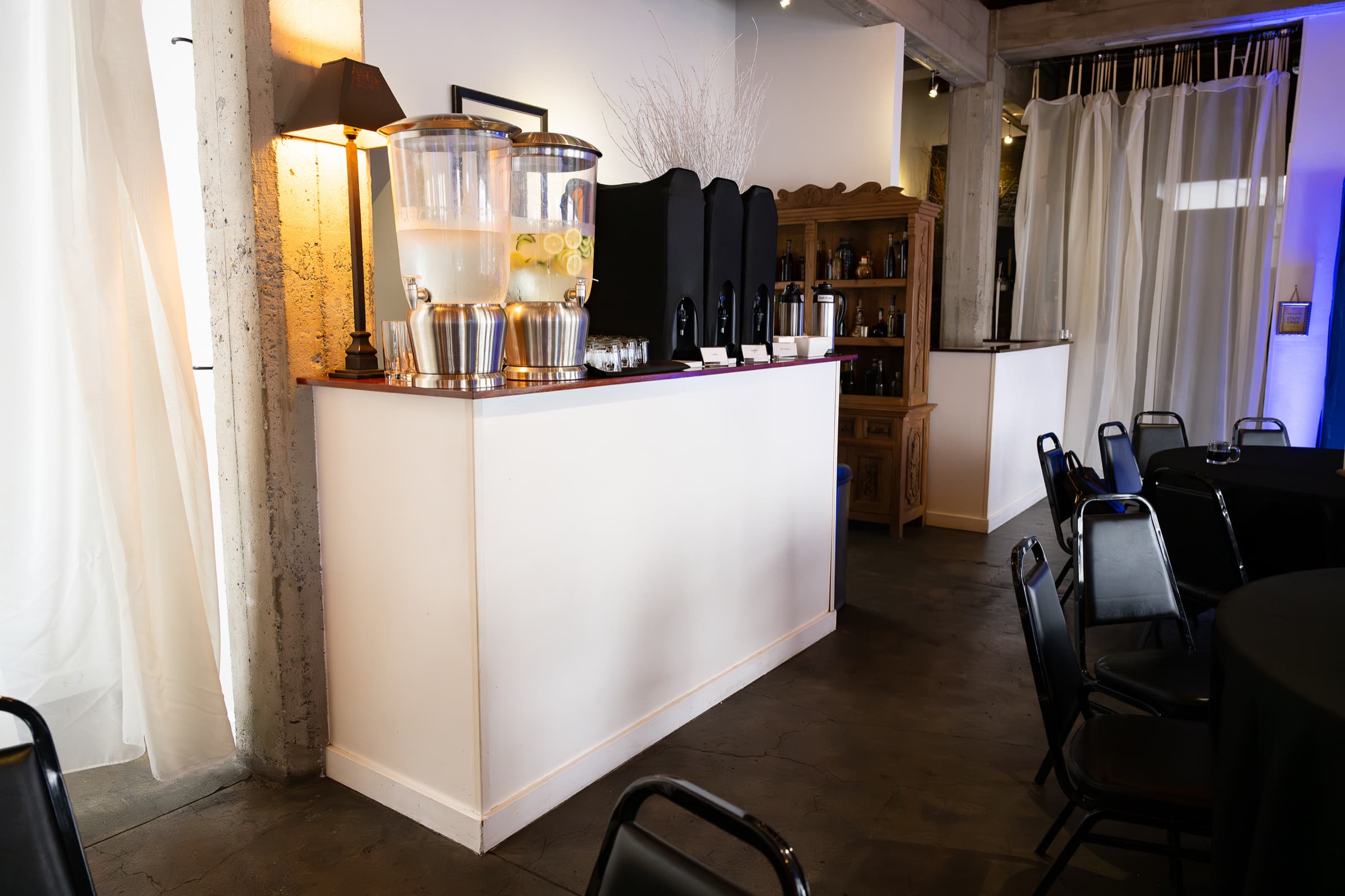 Coffee and beverage station photographed before service at a hosted breakfast