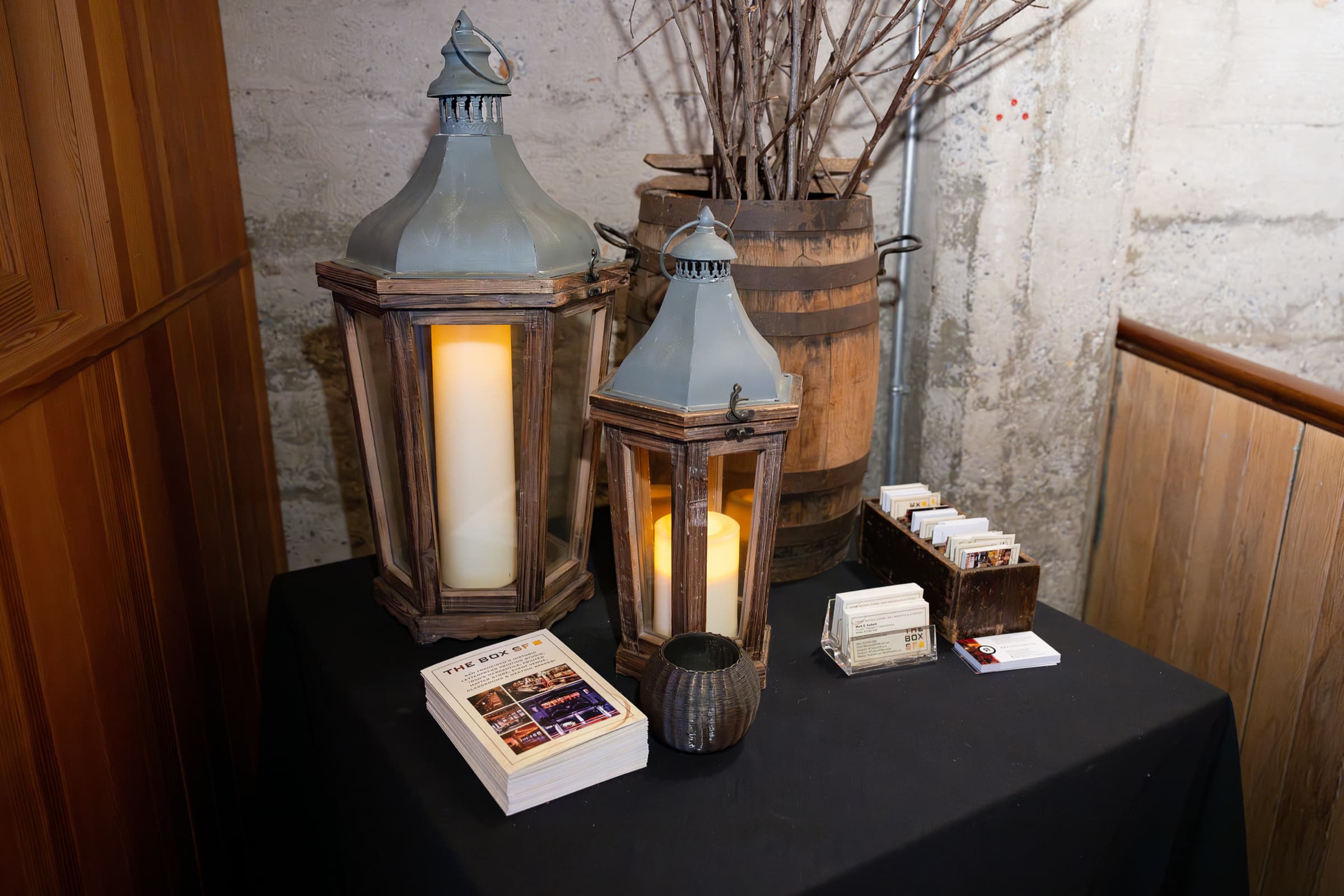 Lantern centerpiece photographed on a table before a hosted morning event