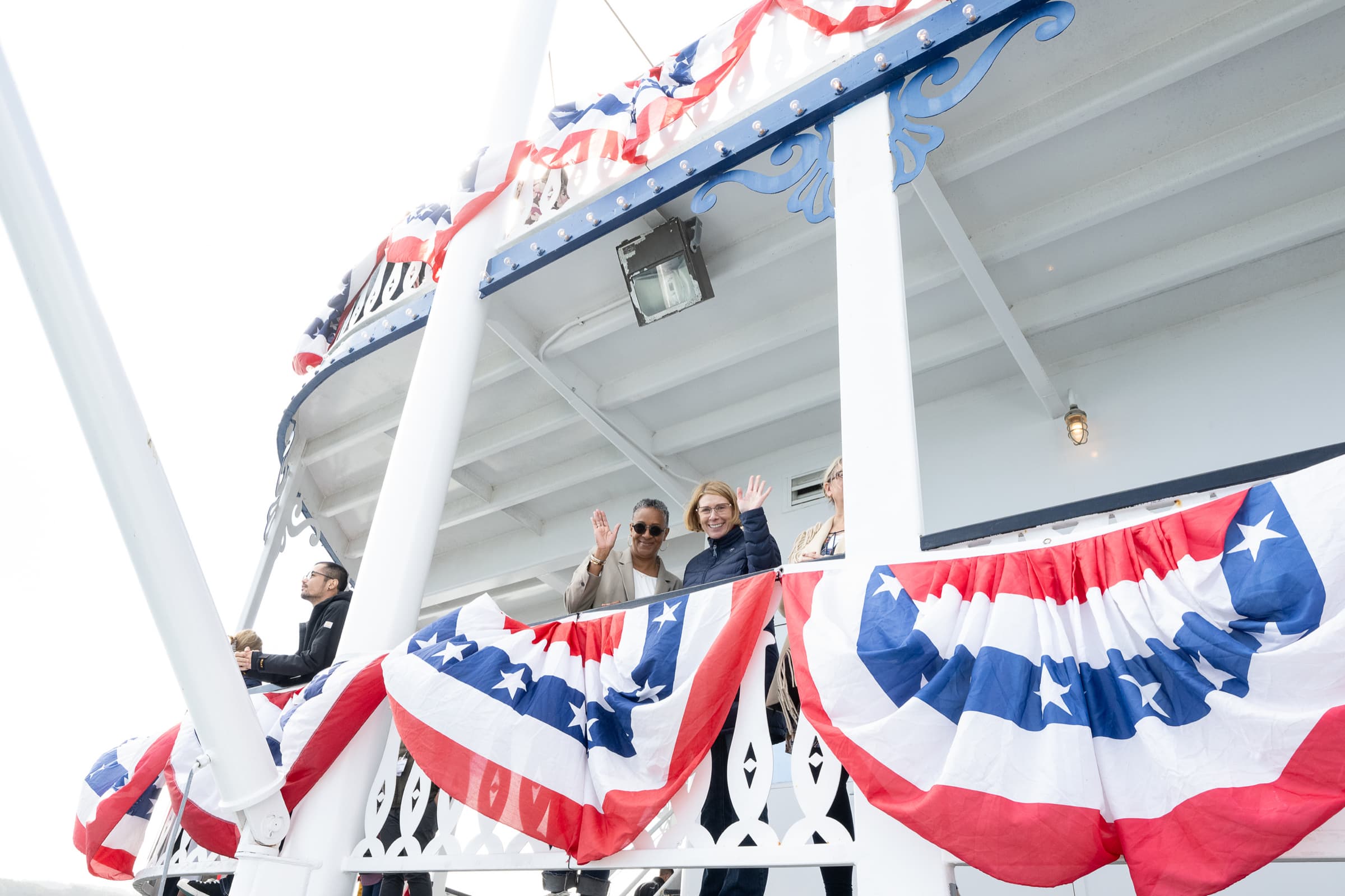Deck railing and bunting detail aboard a chartered vessel