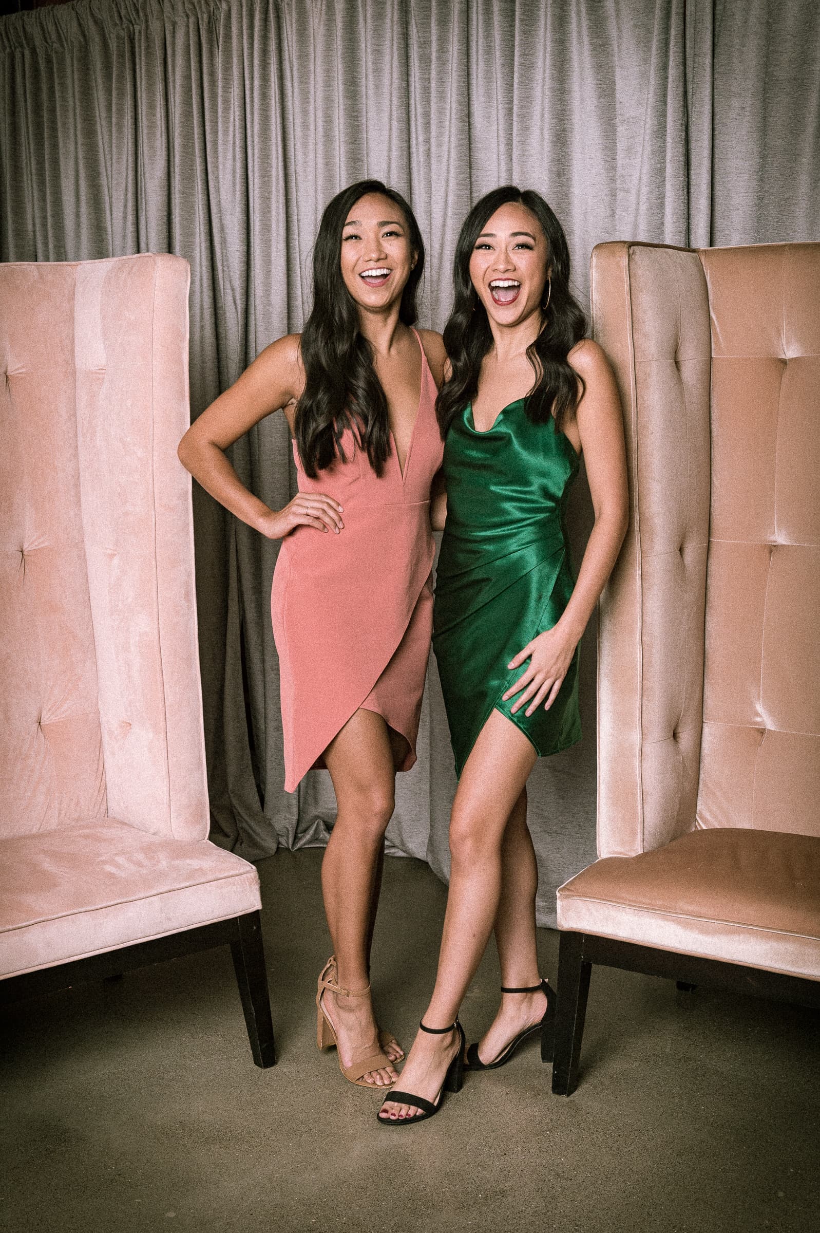 Two guests posed together in a styled portrait vignette