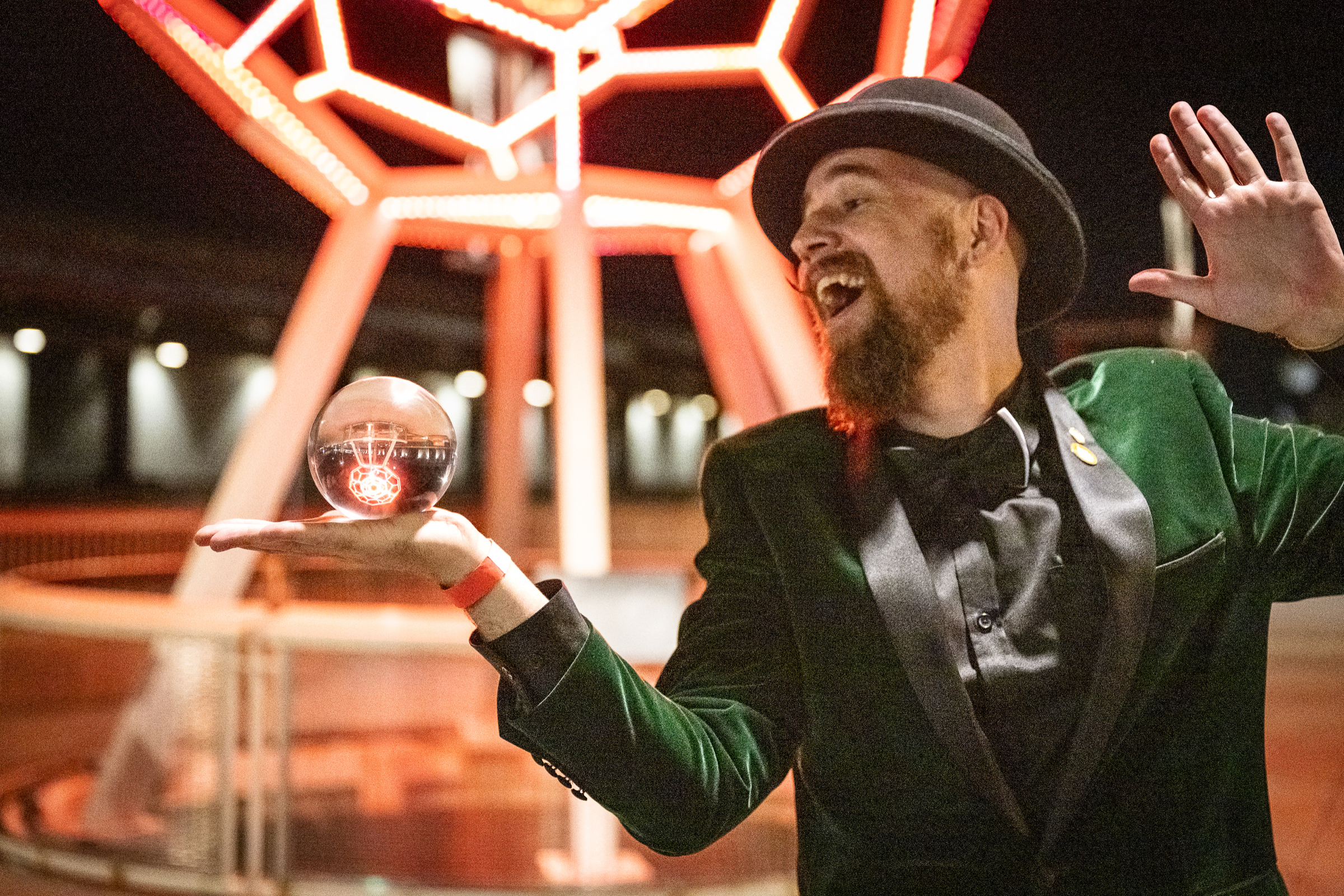 Performer mid-act during an evening event