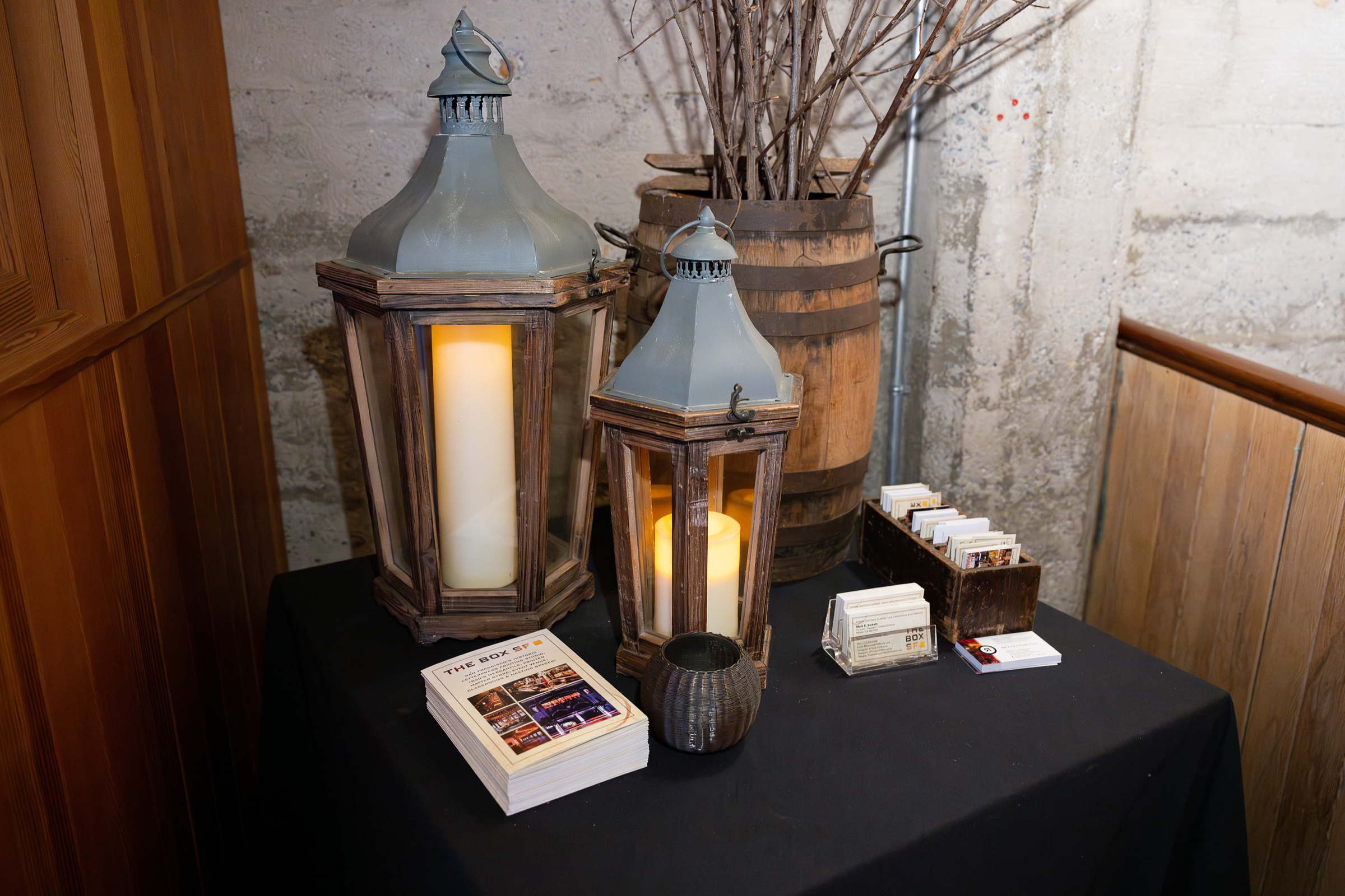 Lantern centerpiece photographed on a table before a hosted morning event