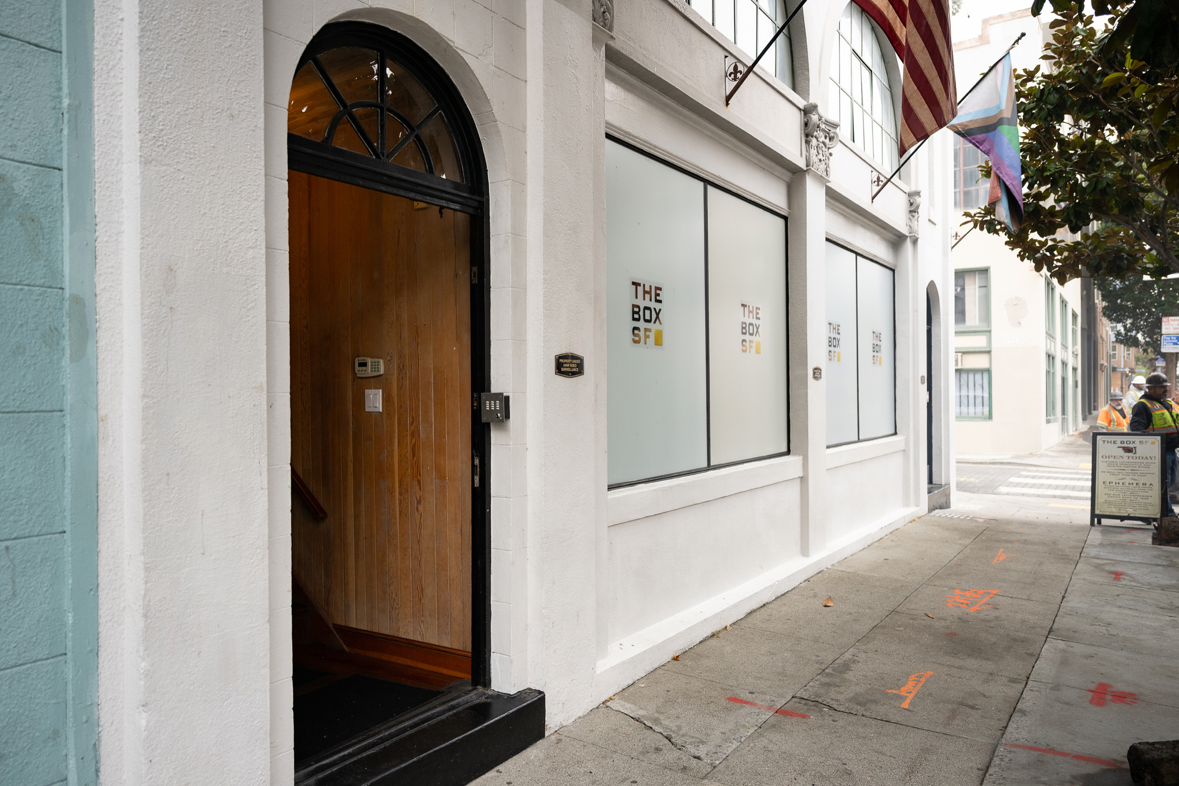 Street entrance to a private event space photographed on the morning of a hosted breakfast