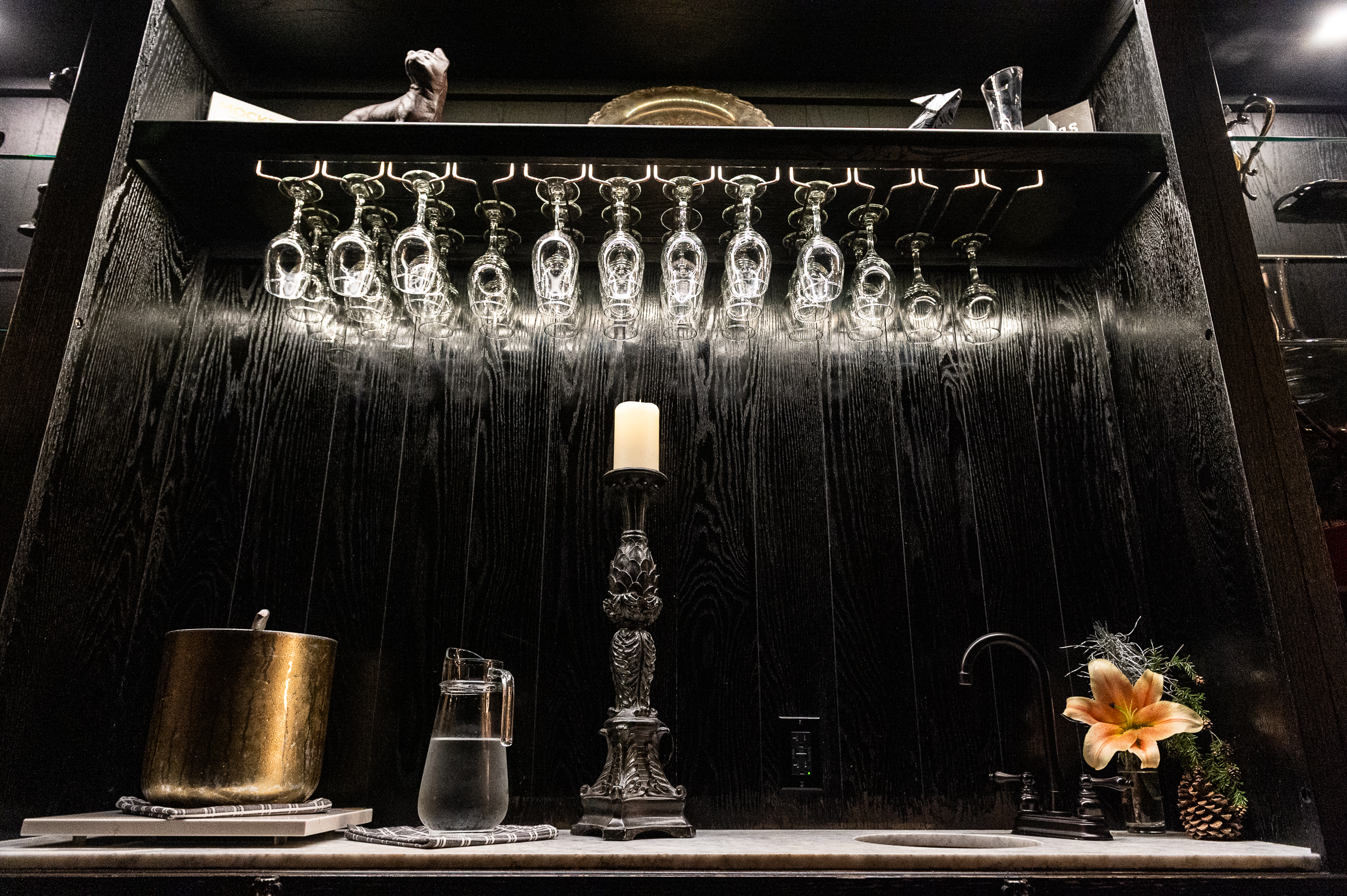 Bar setup with arranged glassware photographed before service begins
