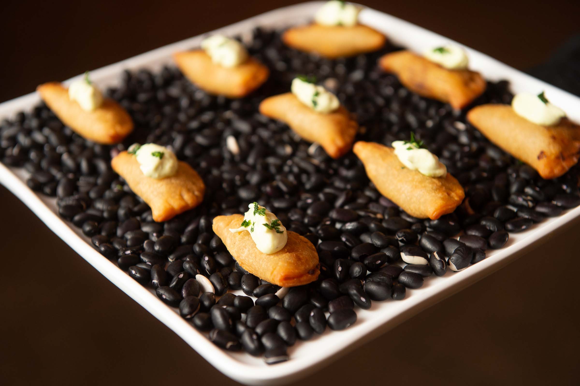 Canapés arranged for service at an evening reception