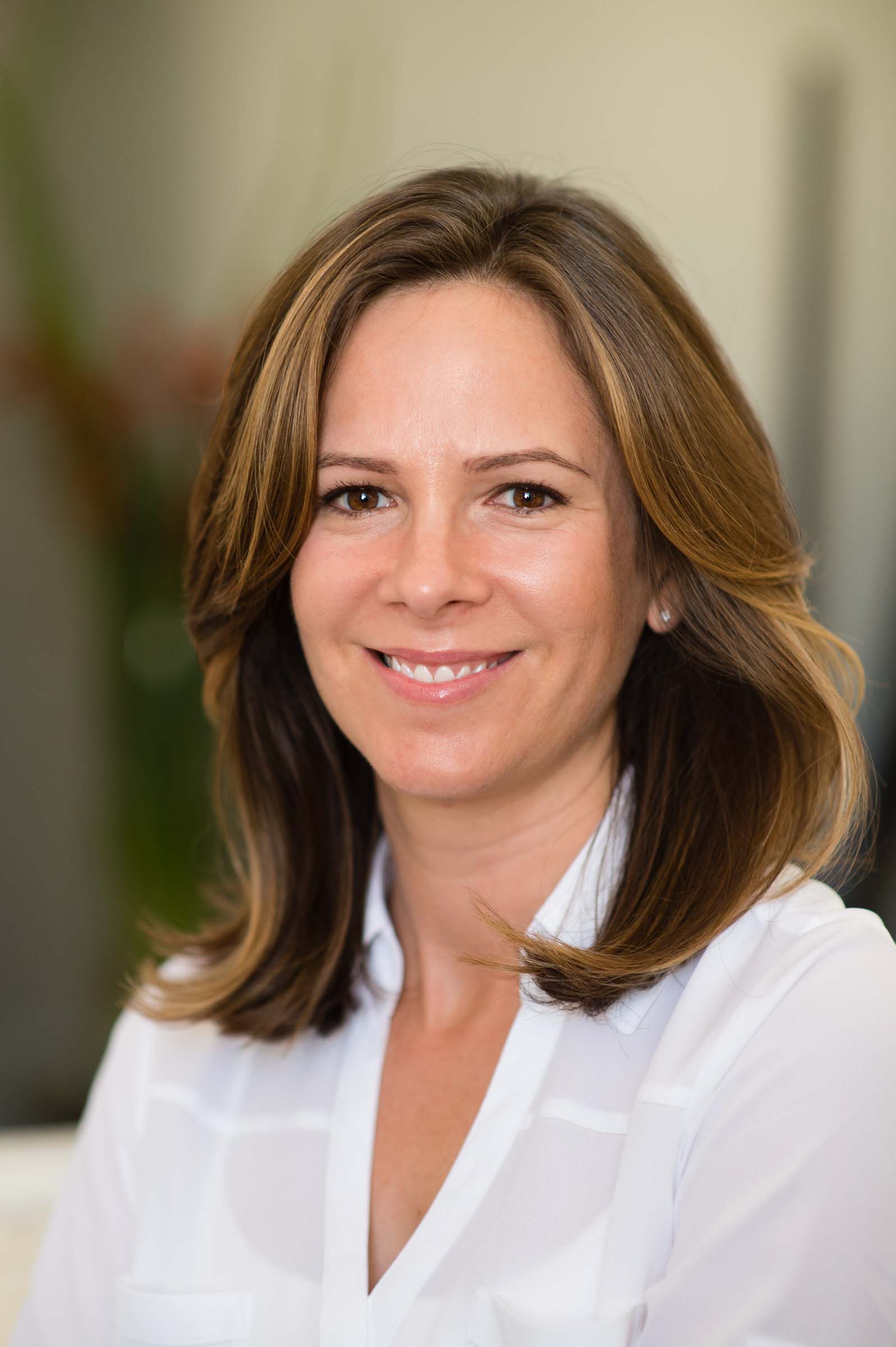 Professional business headshot with clean background