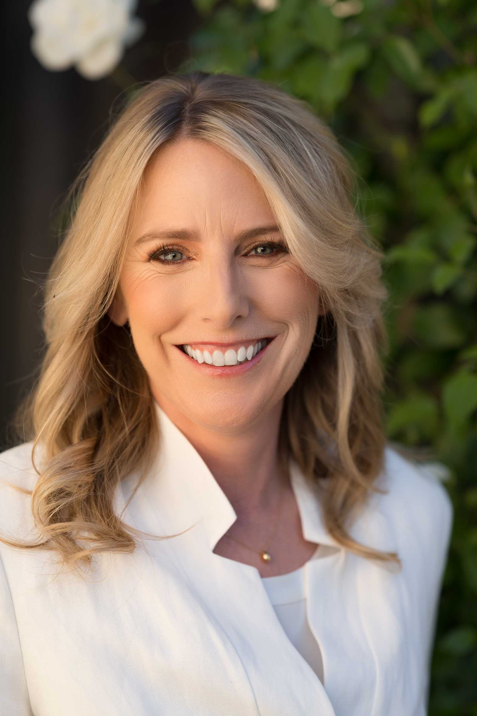 Portrait of woman with garden background