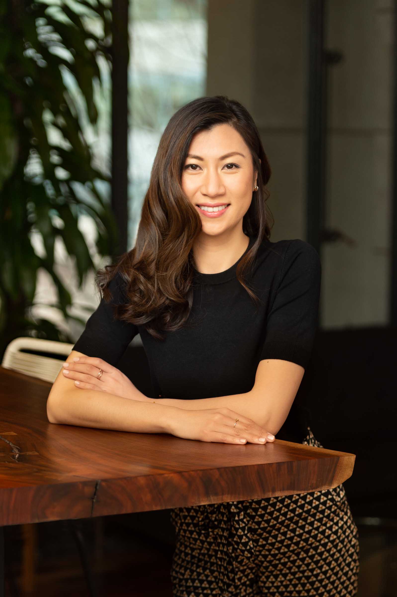 Environmental portrait of professional woman in workplace